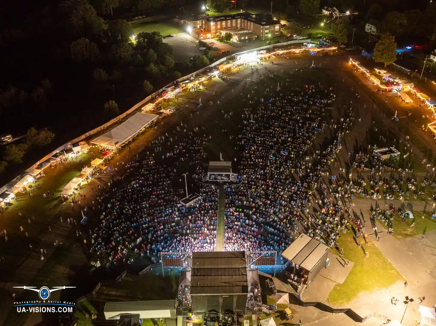 Professional Photography, Videography & Drone Services – Charleston WV Aerial night view of the Healing Appalachia festival crowd and lights