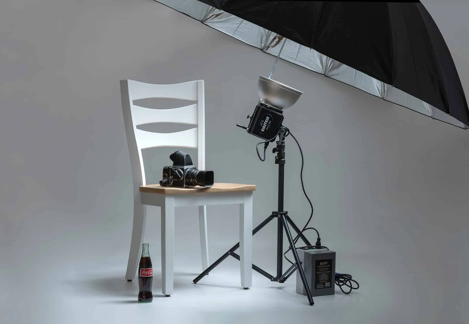Charleston's Finest Portraiture - UA-Visions Studio Magic Professional portrait photography collections studio setup with vintage camera and lighting by UA-Visions in Charleston, WV.