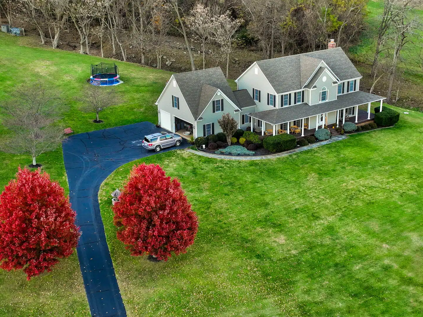 Aerial view of a modern suburban home captured by drone photography.