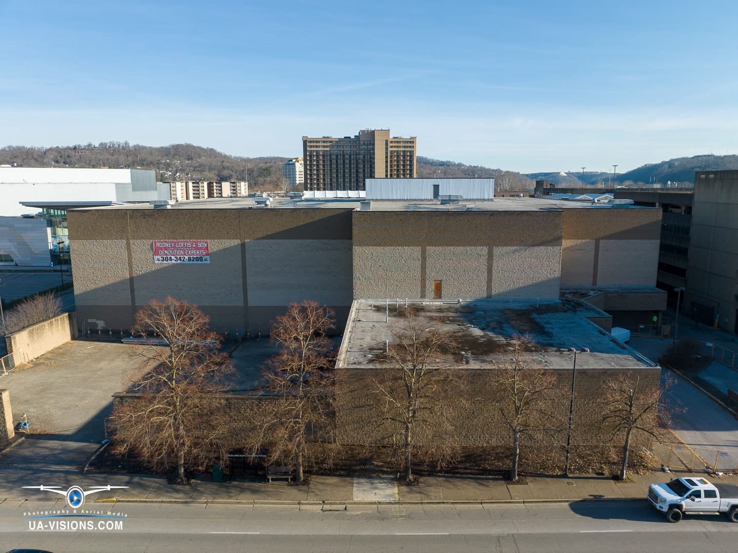 Aerial view of a demolition progression project of the Sears building at the Charleston Town Center Mall captured by UA-Visions
