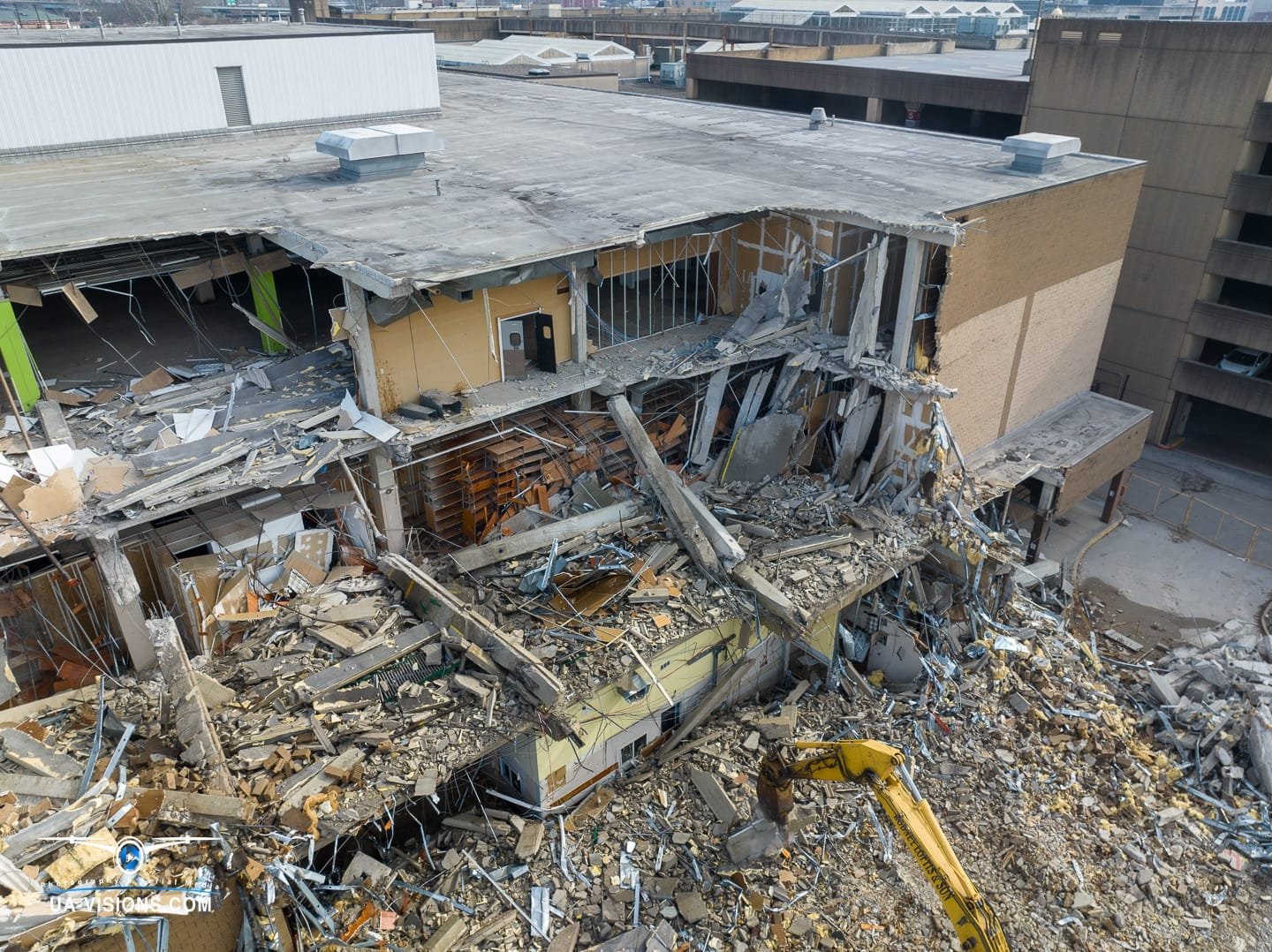 Aerial view of a demolition progression project of the Sears building at the Charleston Town Center Mall captured by UA-Visions