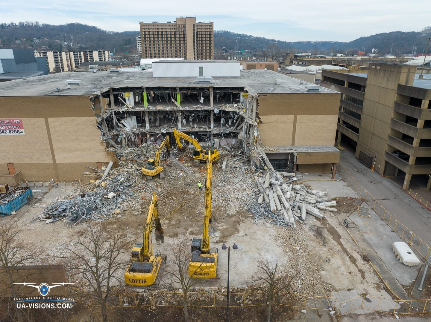 Aerial view of a demolition progression project of the Sears building at the Charleston Town Center Mall captured by UA-Visions