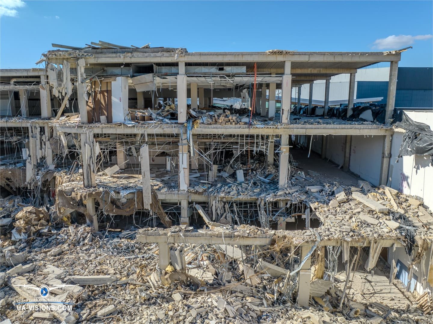 Aerial view of a demolition progression project of the Sears building at the Charleston Town Center Mall captured by UA-Visions