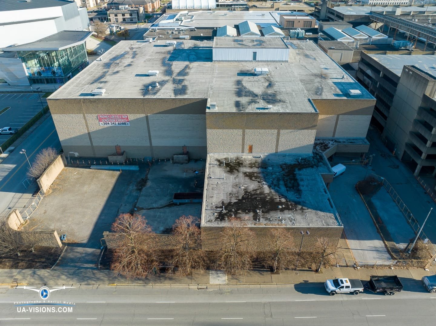 Aerial view of a demolition progression project of the Sears building at the Charleston Town Center Mall captured by UA-Visions