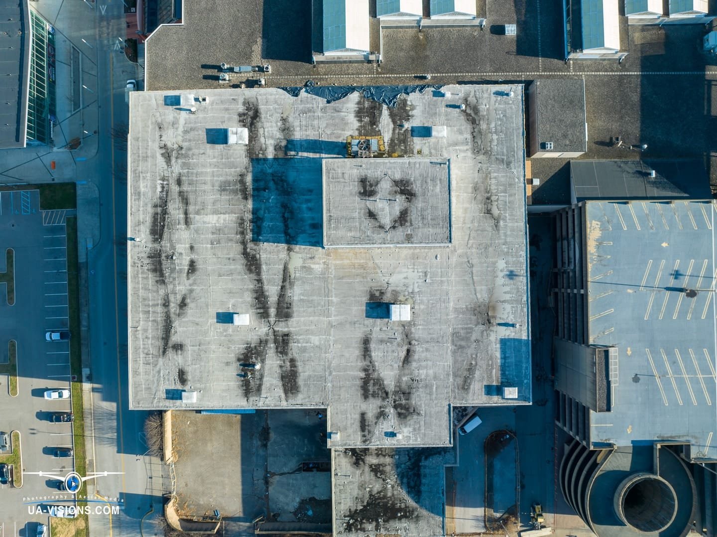 Aerial view of a demolition progression project of the Sears building at the Charleston Town Center Mall captured by UA-Visions