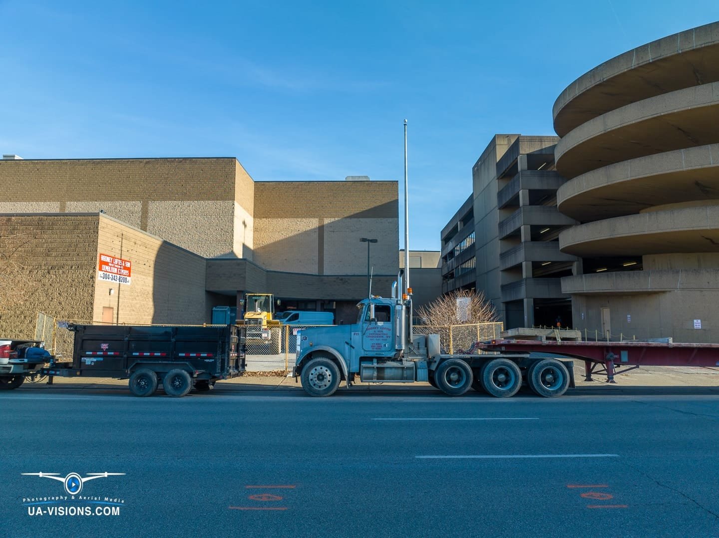 Aerial view of a demolition progression project of the Sears building at the Charleston Town Center Mall captured by UA-Visions