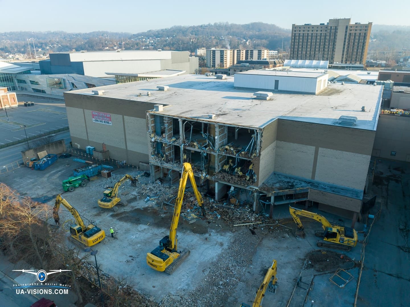 Aerial view of a demolition progression project of the Sears building at the Charleston Town Center Mall captured by UA-Visions