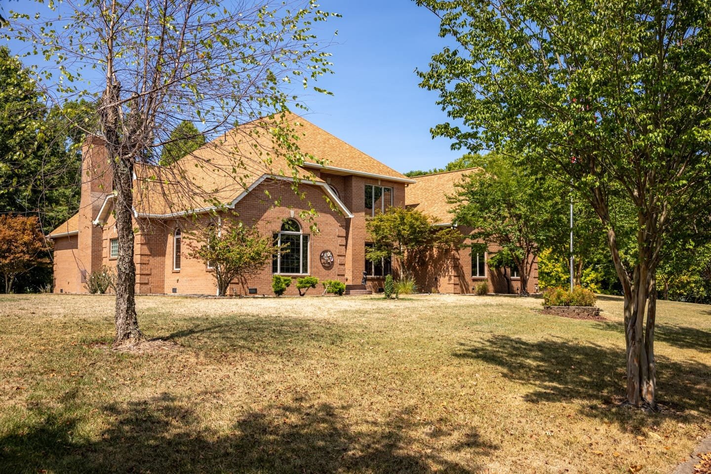 Exterior ground level photos of a residential real estate listing on Moriah Drive