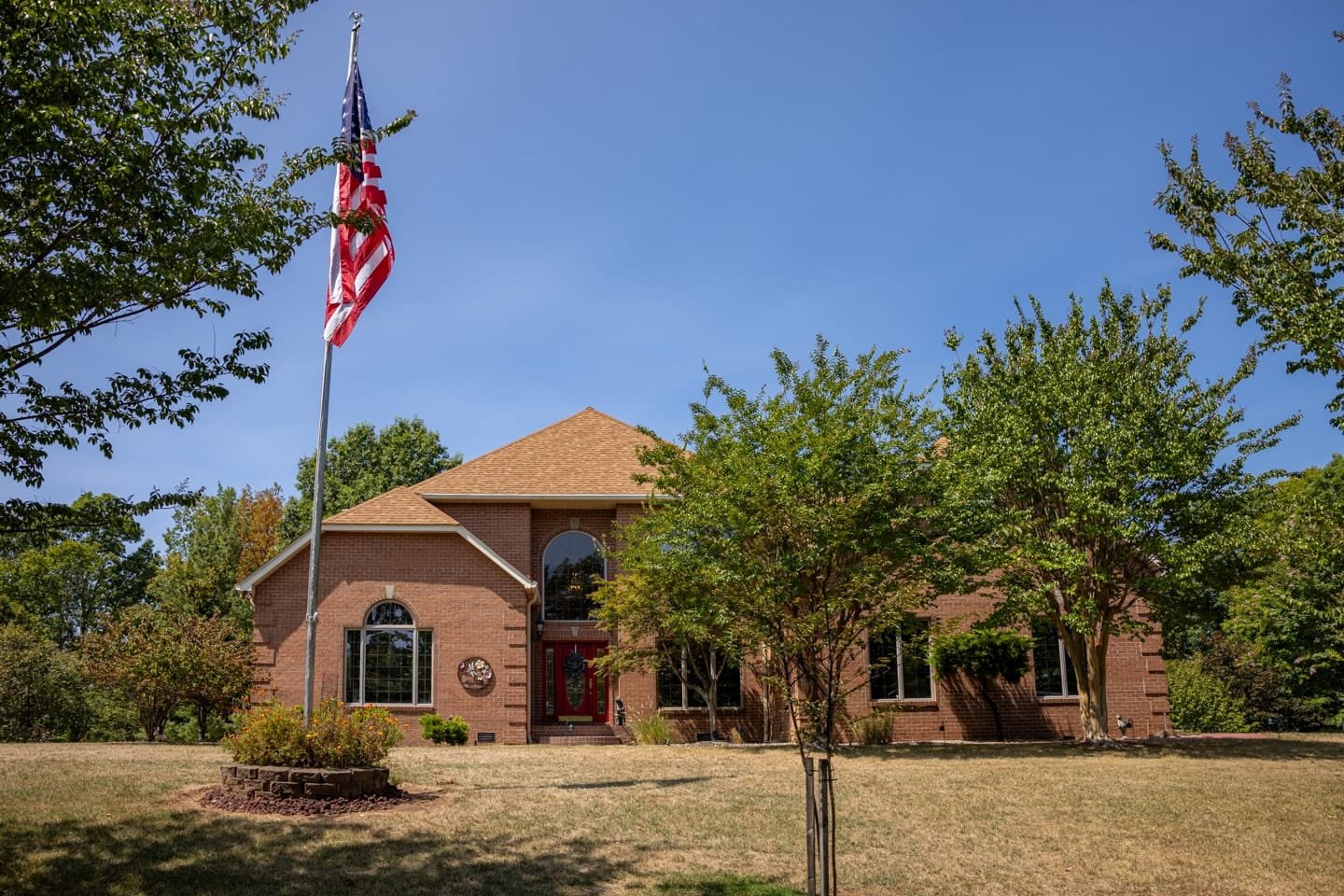 Exterior ground level photos of a residential real estate listing on Moriah Drive