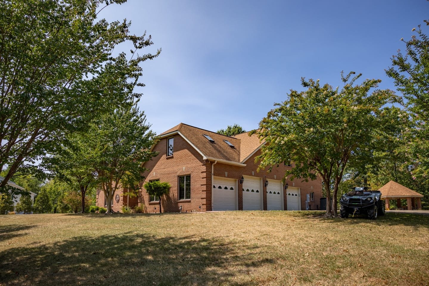 Exterior ground level photos of a residential real estate listing on Moriah Drive