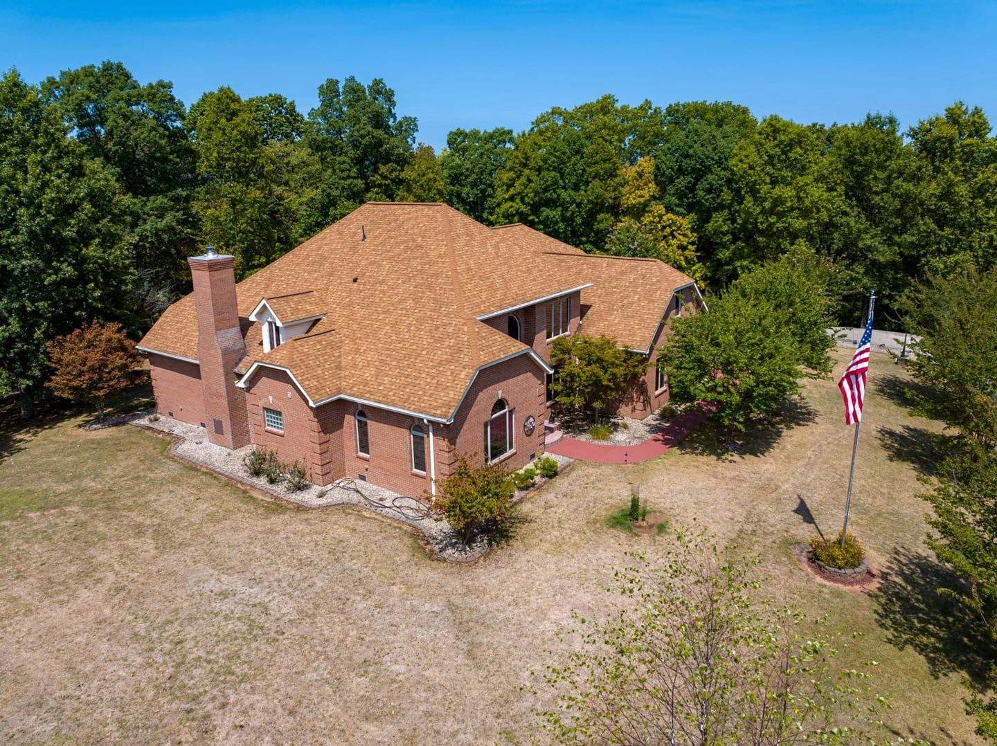 Low Level Aerial view of a residential real estate listing on Moriah Drive
