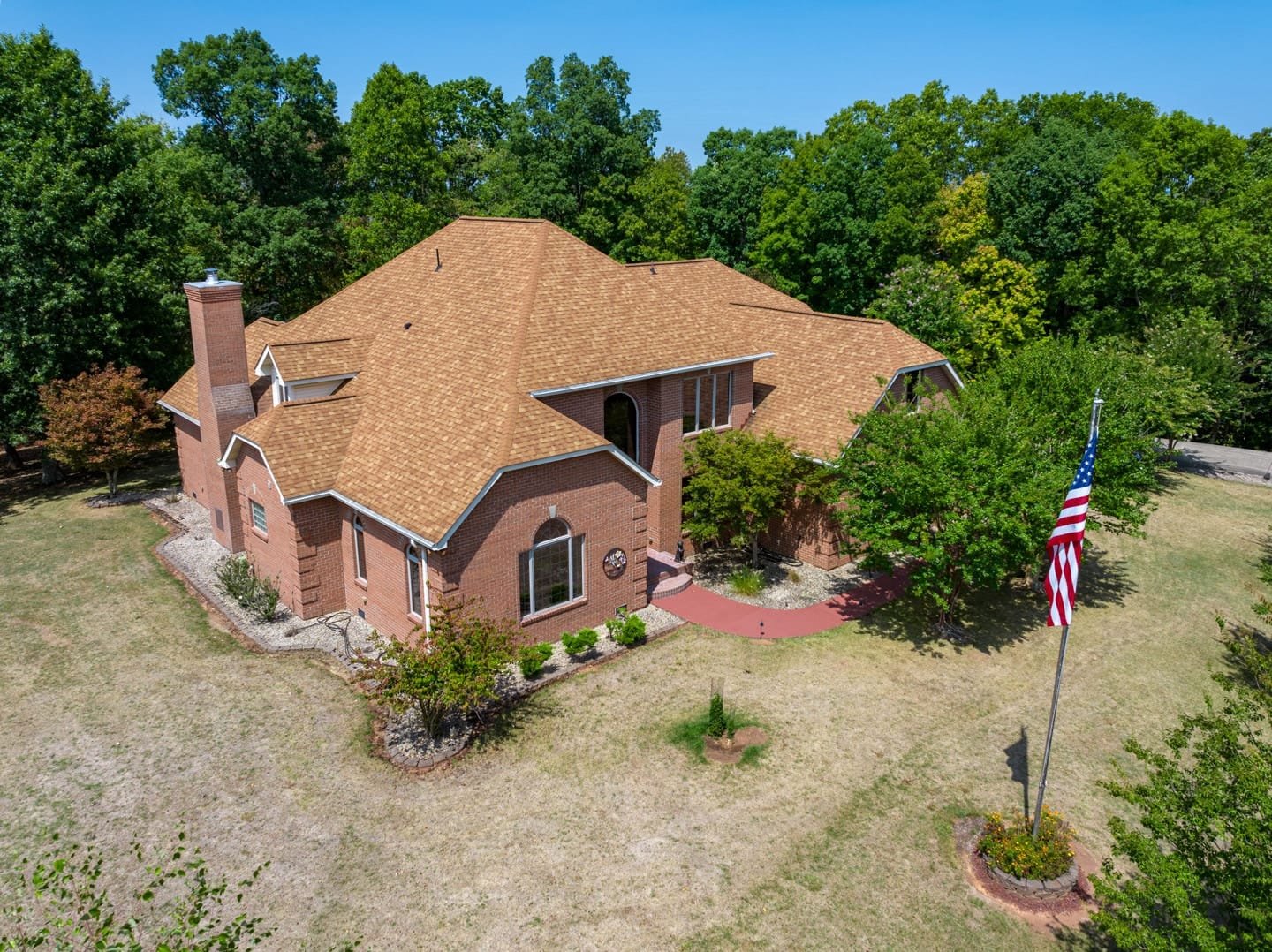 Low Level Aerial view of a residential real estate listing on Moriah Drive