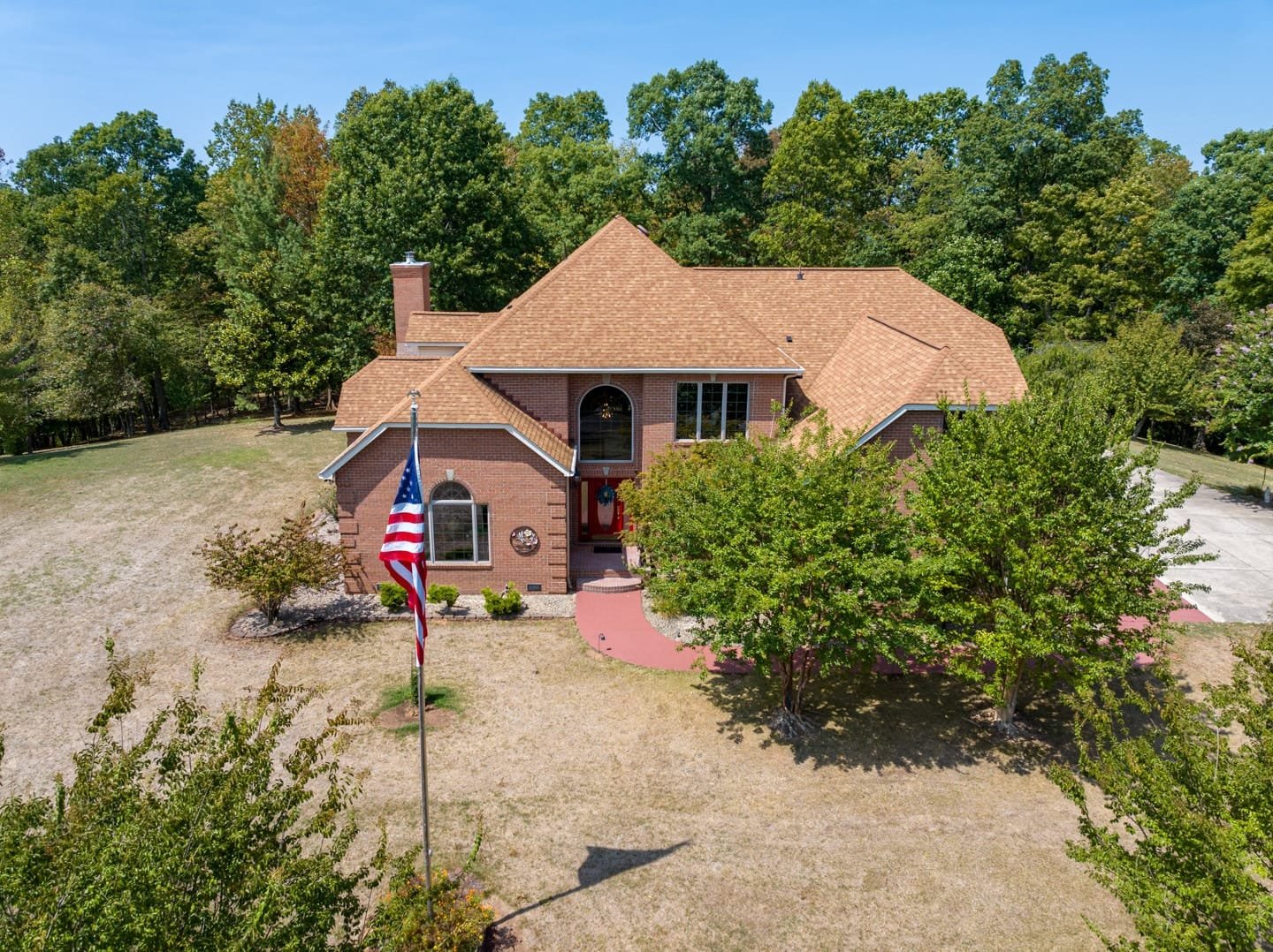 Low Level Aerial view of a residential real estate listing on Moriah Drive