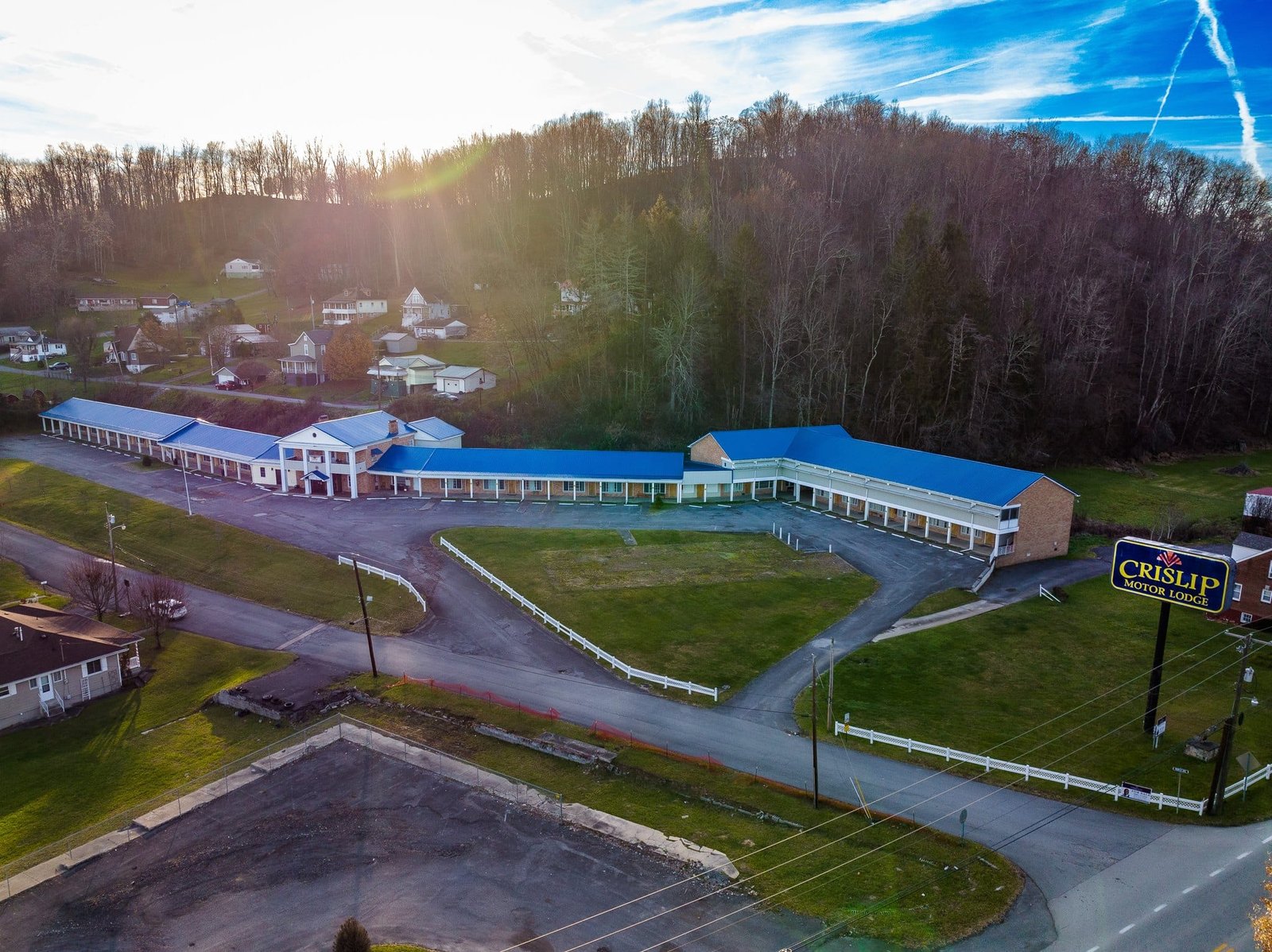 Crislip Motor Lodge Aerial Photography Evening aerial photograph of Crislip Motor Lodge and the wooded hillside behind it