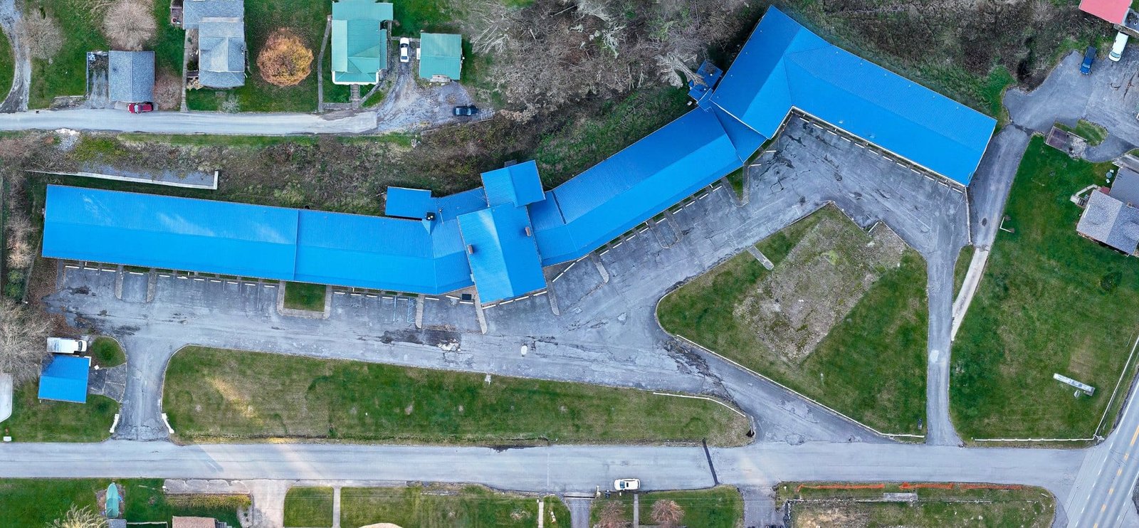 Crislip Motor Lodge Aerial Photography Top-down aerial view of the motor lodge buildings and parking area