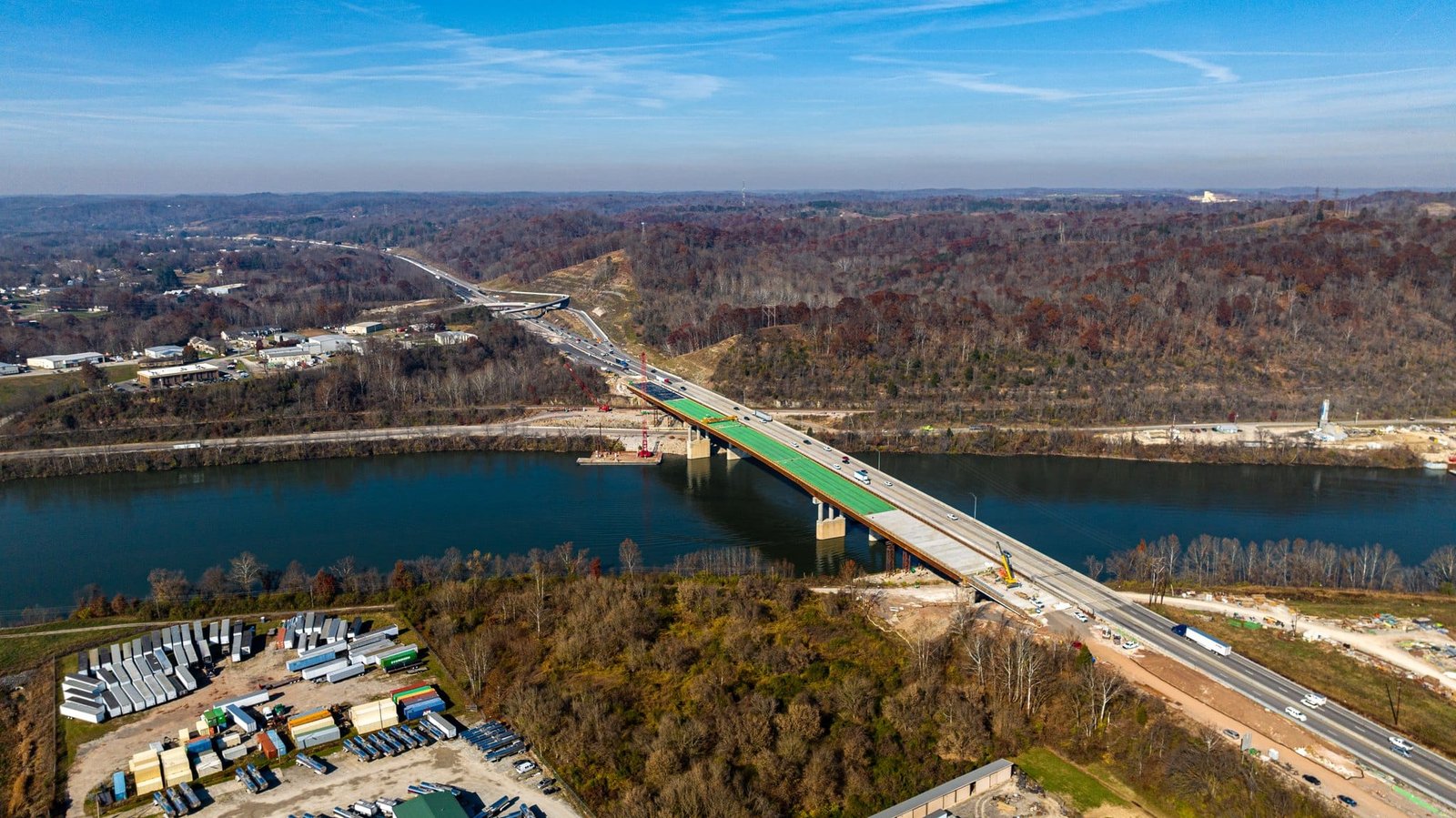 Mead & Hunt Team and Project Photography Wide aerial view of bridge construction and the riverfront setting