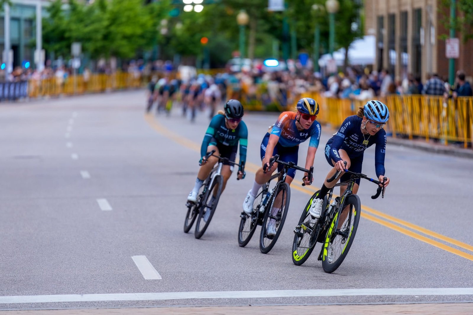 USA Cycling 2025 Photography and Video Cyclists leaning through a city-street corner during USA Cycling racing in Charleston